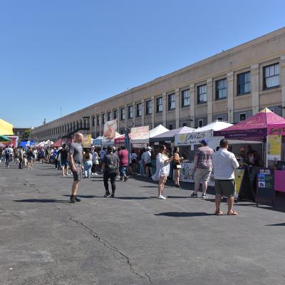 A lane of vendors during Smorgasburg LA, a Sunday outdoor food and shopping market event in California.