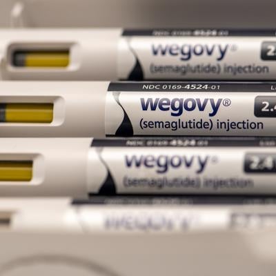 A stack of 2.4mg Wegovy injection pens