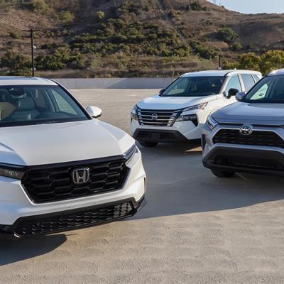 onda CR-V, Toyota RAV4, and Nissan Rogue cars on a wide lot.