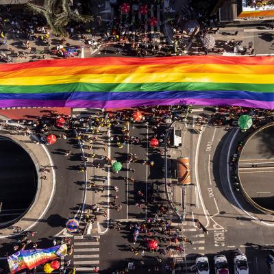 An aerial shot of a massive pride flag from the 28th edition of São Paulo LGBT+ Pride Parade in Brazil.
