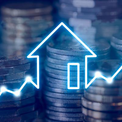 Stacks of coins with a house icon and an arrow pointing upward to the right.