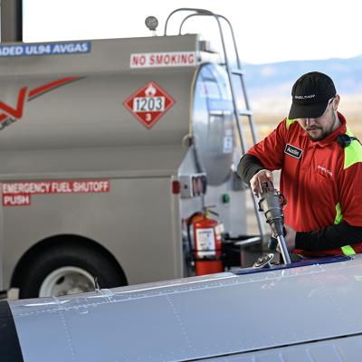 A line service technician refuels a plane using a Federal Aviation Administration approved unleaded aviation fuel at Sheltair at Rocky Mountain Metropolitan Airport.