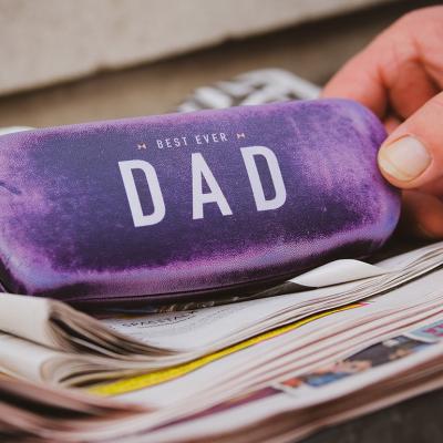 A velvet-covered eyeglasses case with a "Best Ever Dad" inscription.