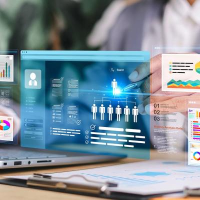 A digital marketing dashboard with informational charts and performance data being utilized by a marketer.