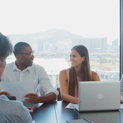 A business team in a boardroom together.
