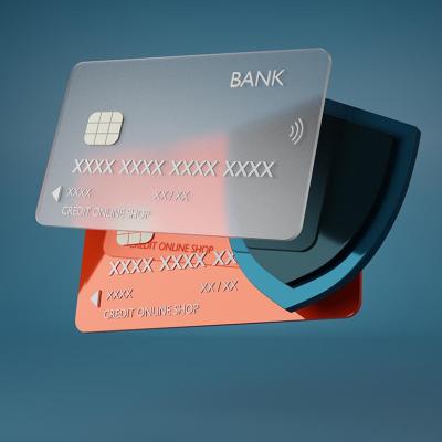A 3D illustration of a credit card and a shield symbolizing digitial financial security. 