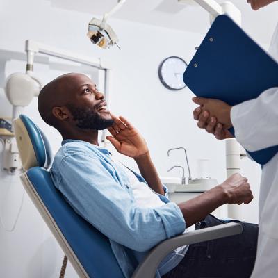 A relieved patient at the dentist during an appointment.