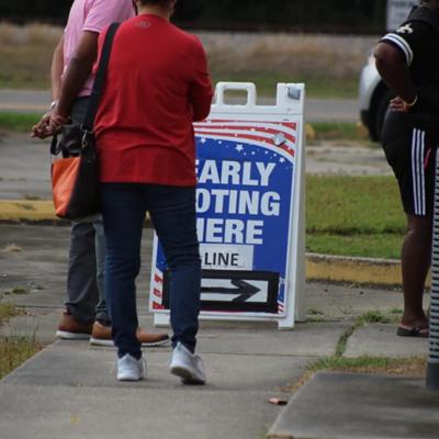 East Baton Rouge Parish, Louisiana, voters stand in line at an early voting location in 2022.