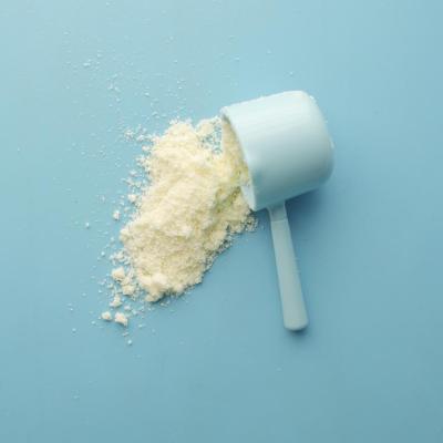 A spilled baby milk powder in a milk scooper.