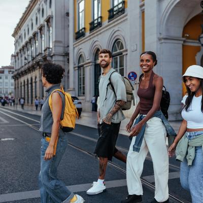 A group of friends checking out the streets of a city.