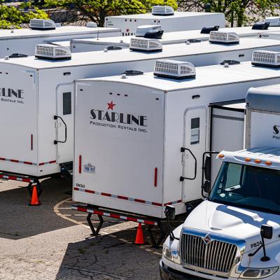 A view of Starline Production rental trucks and trailers.