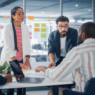 A diverse business group having a meeting in a modern office.