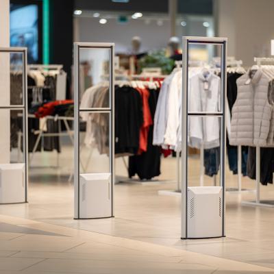 Detectors lined up at the entrance of a clothing store.