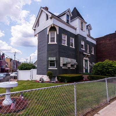 A three-story house built in 1929 and seen along Dawson Street in the south Oakland neighborhood in Pittsburgh, Pennsylvania, USA.