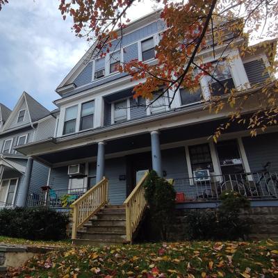 Residential houses along a street in Scranton City, Pennsylvania, USA during autumn.