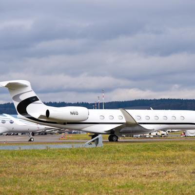 A parked Gulfstream G700 private jet at Zürich Airport in Switzerland.