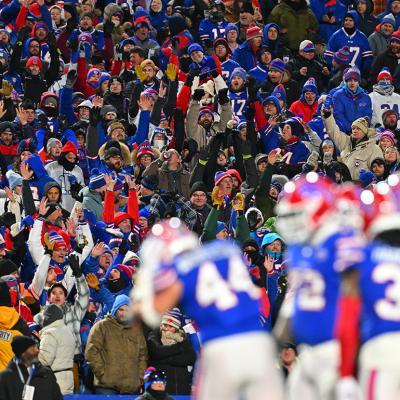 Buffalo Bills fans celebrating through an audience wave during the third quarter game against the New York Jets at Highmark Stadium in New York, USA.