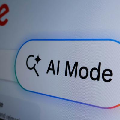 A close-up view of the AI Mode button from Google's search bar displayed on the screen.