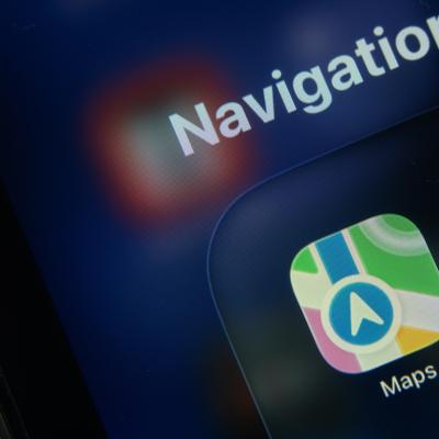 Icon of Apple maps on an iPad screen.