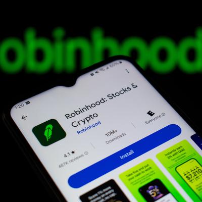 Robinhood, a financial investing app, and its logo displayed on a smartphone.