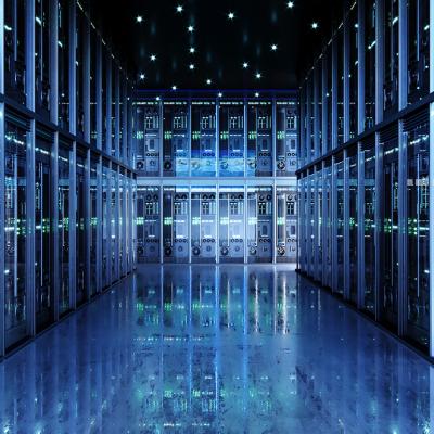 Interior of a data center showing a hall of server packs.