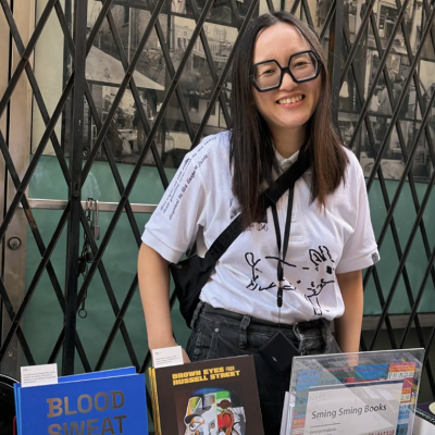 Artist-publisher Vivian Sming posing for a photo in the Sming Sming Books booth.