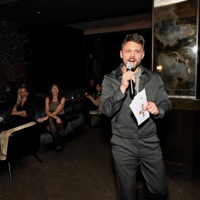 Dating strategist and content creator, Benny Hart, speaks during the Trojan G.O.A.T. event on November 19, 2025 in New York City.