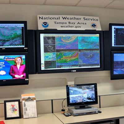 A meteorologist's work station monitoring hurricane alerts in Florida.