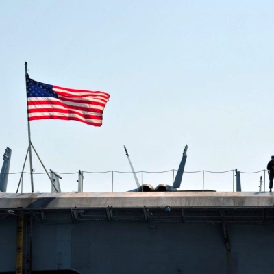 The United States flag is seen within a defense facility.