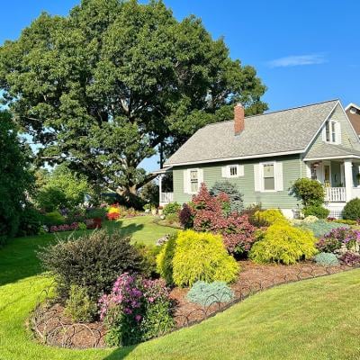 A home with a beautifully manicured lawn.