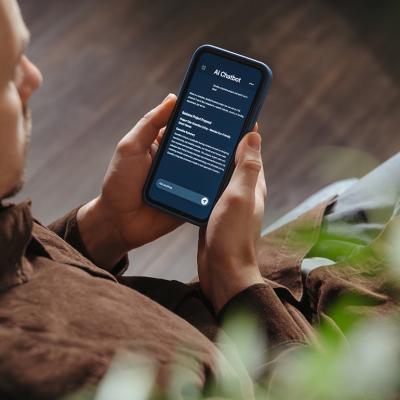 Man using an AI chatbot on a phone.