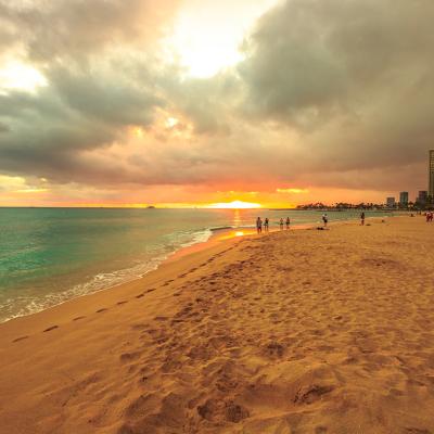 A twilight view seen along the Waikiki beach in Oahu, Hawaii. 