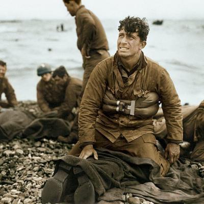 Second Lieutenant Walter Sidlowski on Omaha Beach, Normandy, after helping to rescue a group of soldiers after their landing craft sank on D-Day.