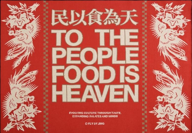 A red Fly By Jing blanket with “To the people food is heaven” in white text.