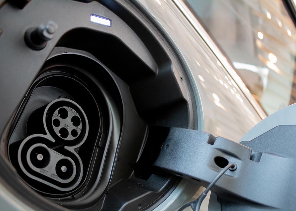 An electric vehicle's charging socket and plug.