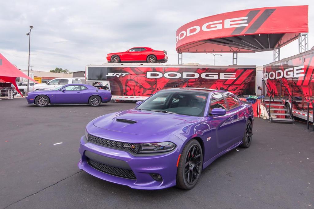 "Plum Crazy" purple 2015 Dodge Challenger and Charger SRT with Scat Pack and Hemi options, at the Woodward Dream Cruise in Royal Oak, Michigan.