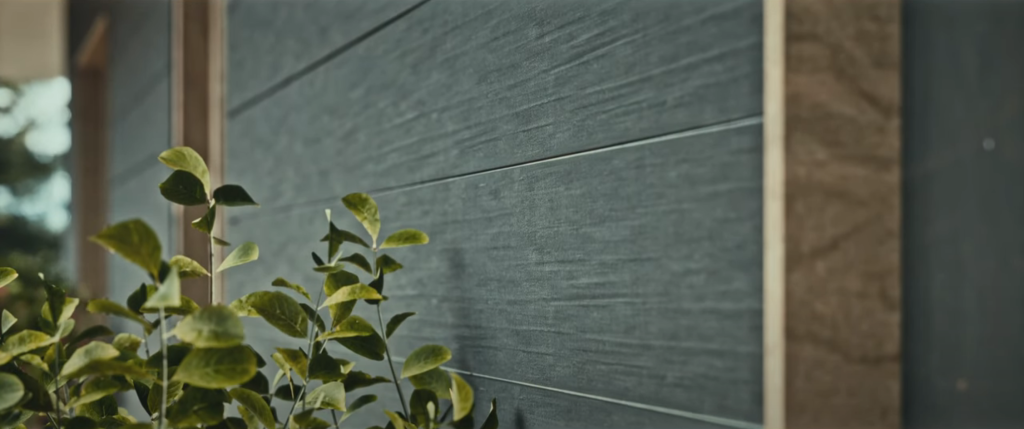Yunesit'in wildfire-resilient house rendering of the scorched wood exterior walls, which are more resistant to catching fire.