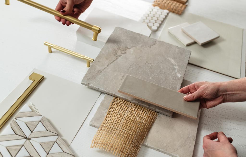A flat lay photo of tiles and house fixtures. 