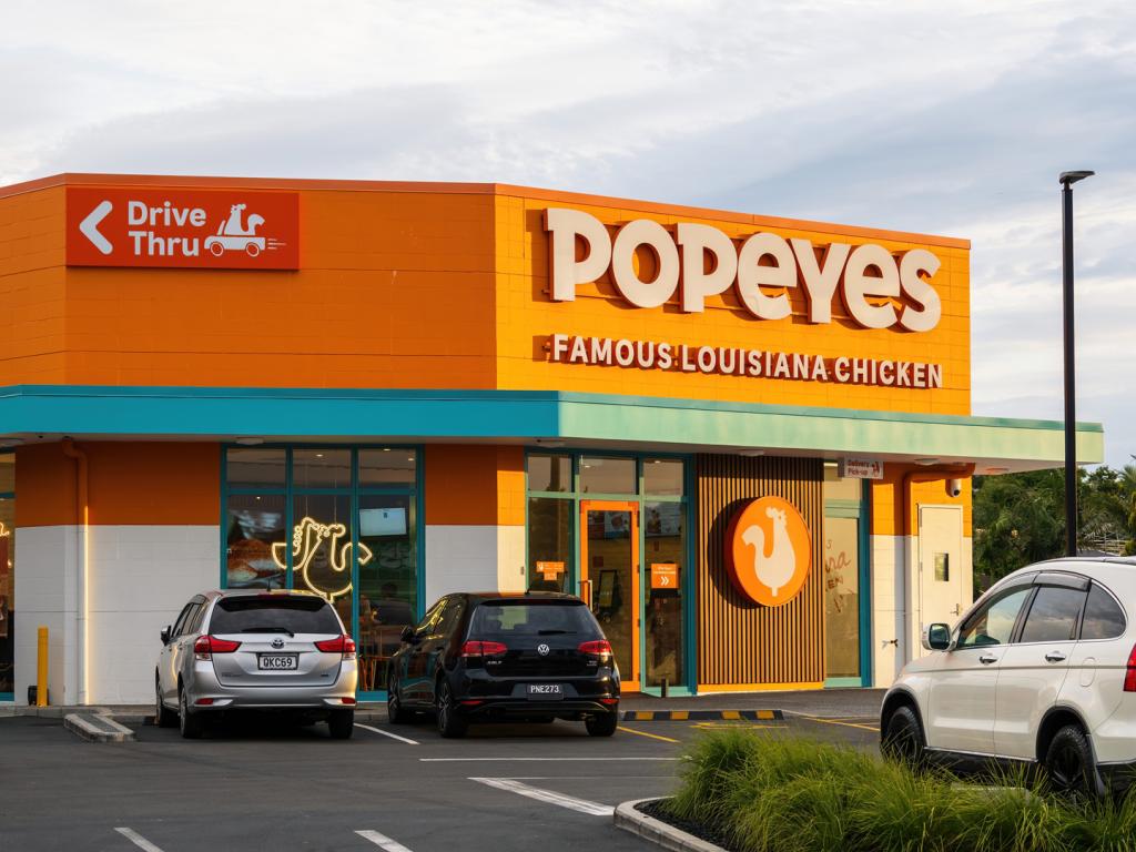 Popeyes Fast Food Restaurant with Drive Thru and Parking. 