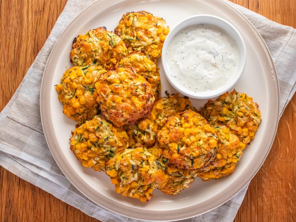 A plate of sweet corn fritters.