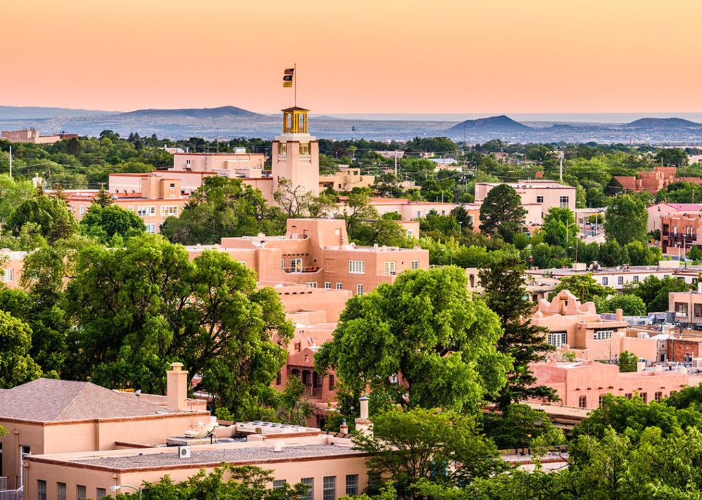 A downtown skyline at dusk in Santa Fe, New Mexico, USA.