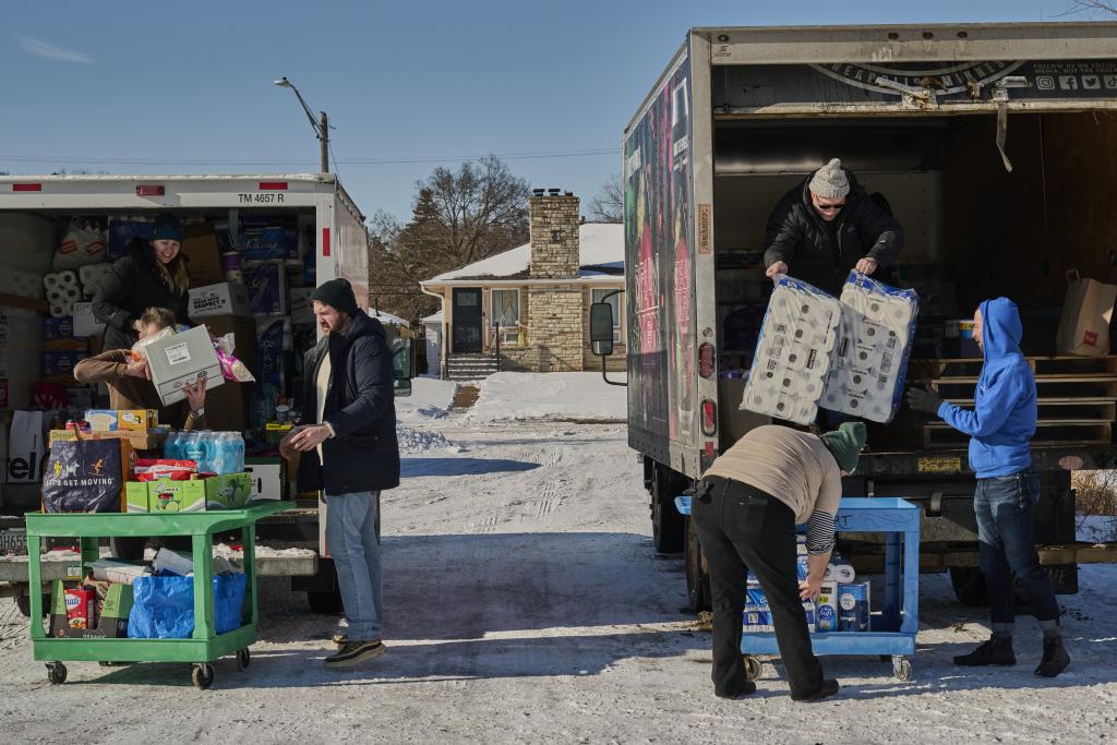 Volunteers with Community Aid Network MN. In the final week of January, the organization served roughly 575 families, nearly double its November numbers.