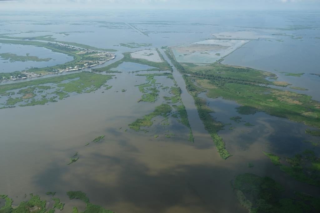 Former oil field in Plaquemines Parish on May 24, 2025 at a site named in one of the coastal damage cases, where the dredging of canals and dumping of toxic waste is alleged to have contributed to significant land loss around the community of Delacroix.