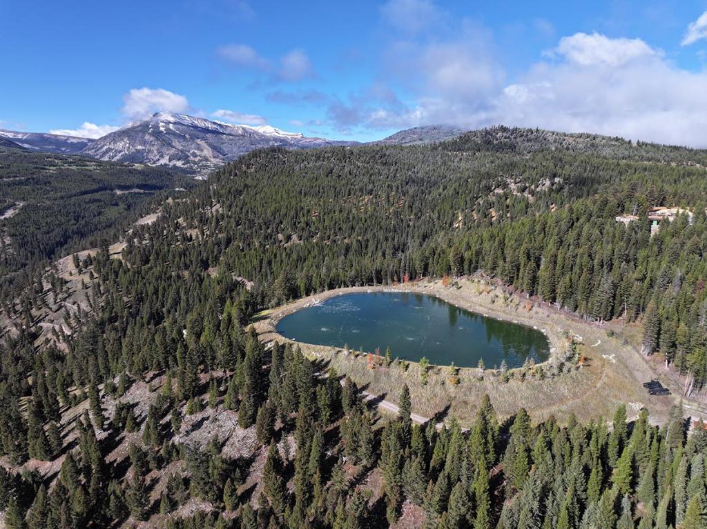 A wastewater pool built by the Yellowstone Club’s owners sits perched high above the headwaters of the Gallatin River. In 2016, a similar wastewater pool leaked more than 30 million gallons of the club's sewage into the river below, drawing over $300,000 in penalties and outraging locals.