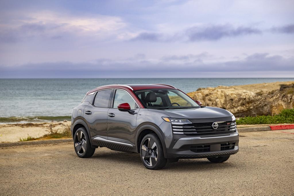 A 2026 Nissan Kicks car parked by the seaside.
