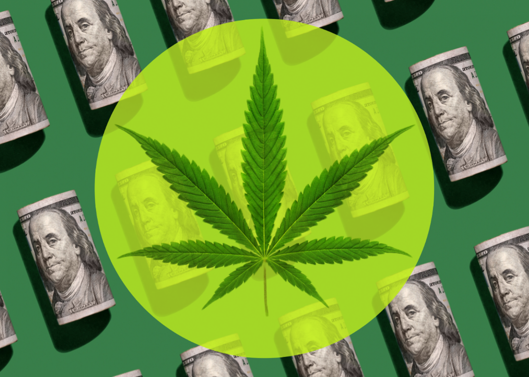 Cannabis leaf over currency background.