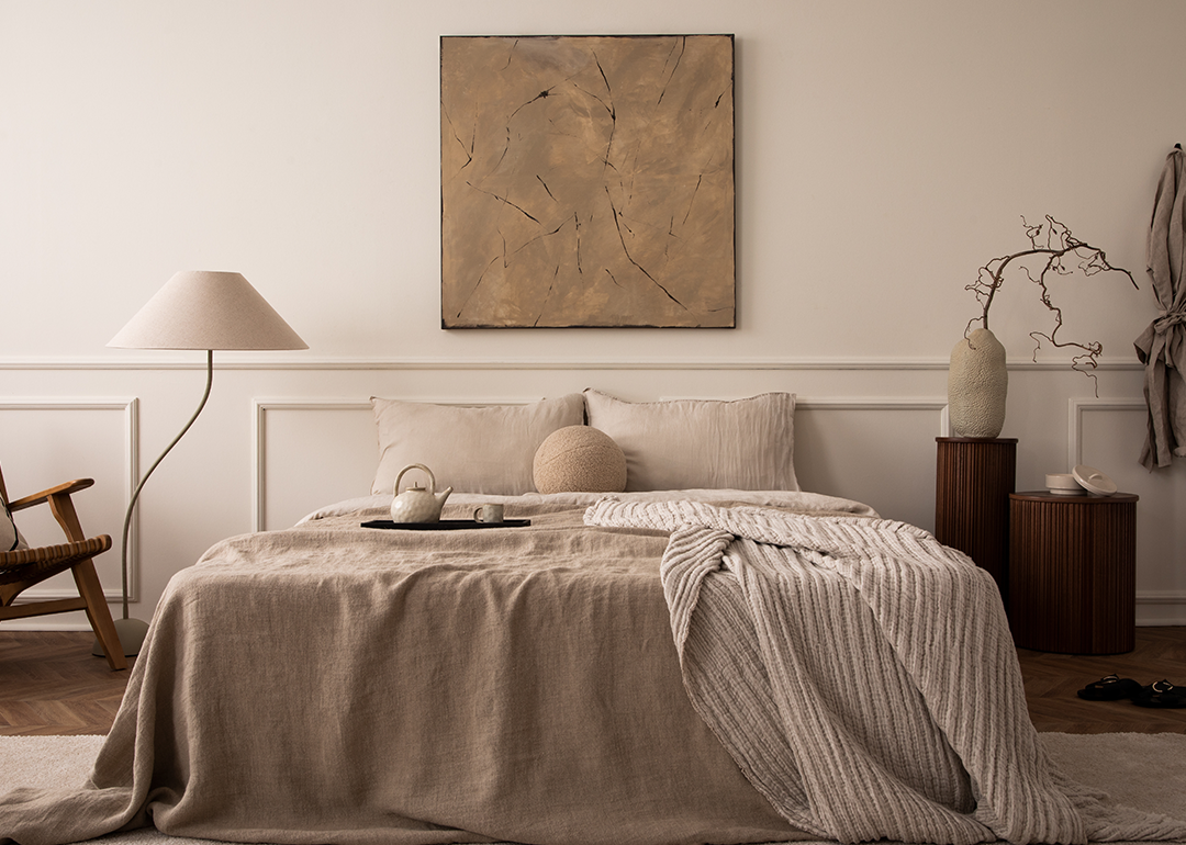 Japandi style bedroom in warm neutral colors.