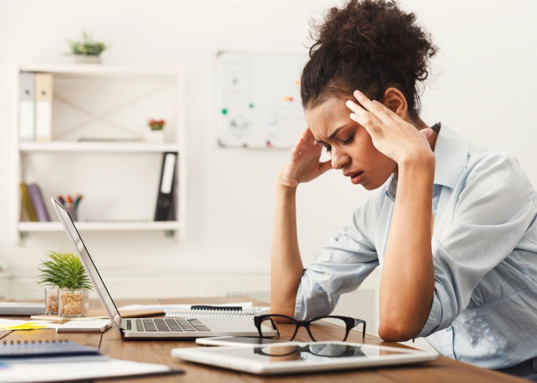 Woman suffering from headache.