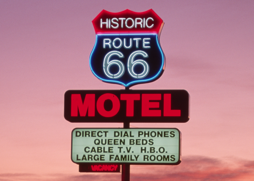 “Historic Route 66” Motel sign at dusk.