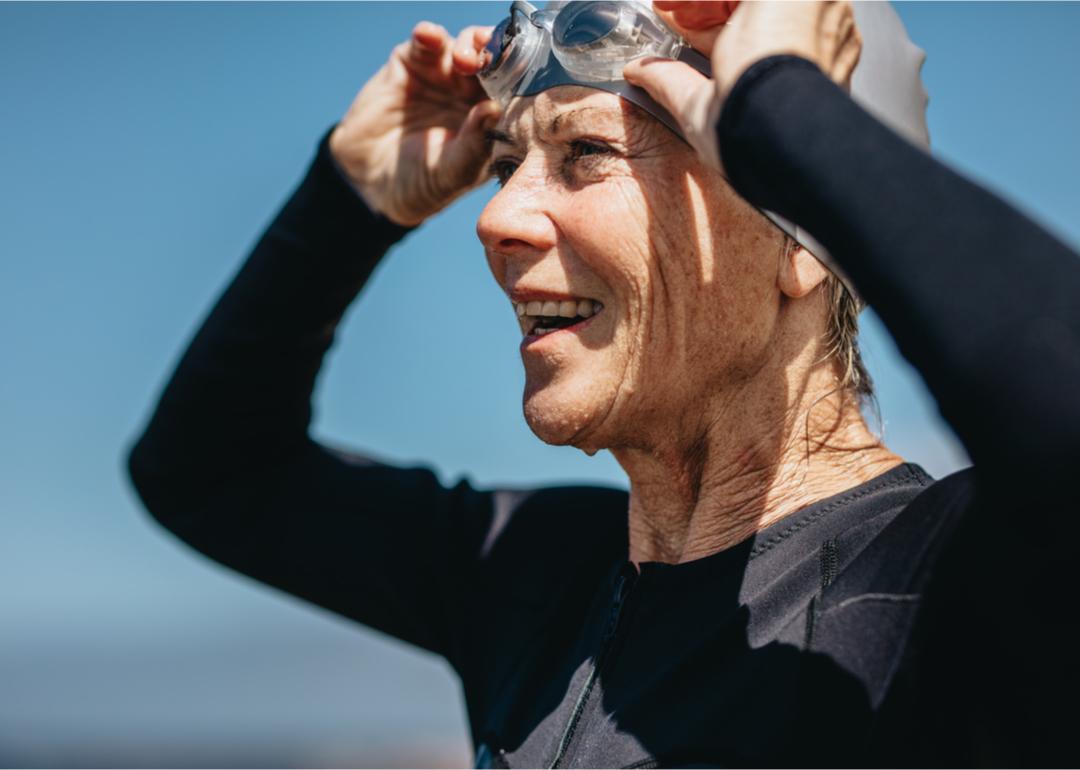 Portrait of smiling healthy mature woman in swimsuit